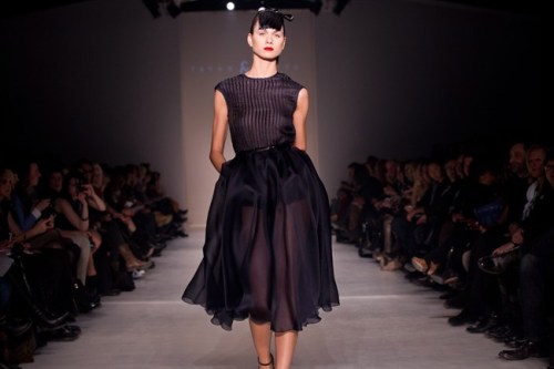 A model wears a design by Tavan & Mitto at Montreal Fashion Week. The latest edition of Montreal Fashion Week runs from Sept. 4-7. THE CANADIAN PRESS/HO - Jimmy Hamelin