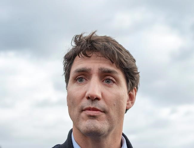 Liberal Leader Justin Trudeau speaks to the media while campaigning in Saint-Anaclet, Que., on Friday, October 4, 2019. Trudeau's combative attitude to some provincial premiers may not be just campaign rhetoric - his platform is promising to turn it into government policy if the Liberals are re-elected. THE CANADIAN PRESS/Ryan Remiorz