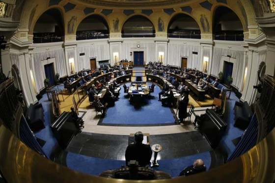Manitoba Chief Justice Richard Chartier reads the Speech from the Throne on the first day of Manitoba Premier Brian Pallister's government's session at the Manitoba Legislature in Winnipeg on September 30, 2019. Manitoba's Progressive Conservative government is to lay out its plans for the coming year in a throne speech at the legislature this afternoon. Premier Brian Pallister's government is expected to focus on fulfilling its promises from the summer election campaign, which included small tax cuts and loosening some restrictions on businesses.Manitoba's Progressive Conservative government is to lay out its plans for the coming year in a throne speech at the legislature this afternoon. Premier Brian Pallister's government is expected to focus on fulfilling its promises from the summer election campaign, which included small tax cuts and loosening some restrictions on businesses. THE CANADIAN PRESS/John Woods