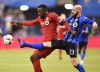 Toronto FC forward Jozy Altidore (17) battles for the ball with Montreal Impact defender Laurent Ciman (23) during first half action in the first leg of the MLS Eastern Conference final at the Olympic Stadium in Montreal on November 22, 2016. Toronto FC defender Laurent Ciman says while he has nothing but respect for his former team in Montreal as well as its fans, he wears red now. 