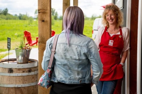 Rachel Bolongaro, founder of the Fraser Valley Cider Company, greets guests at the cidery in Langley, B.C., on May 10, 2018. THE CANADIAN PRESS/HO, Fraser Valley Cider Company *MANDATORY CREDIT*