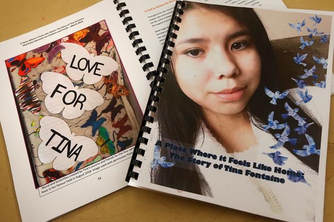Copies of a special report on the death of fifteen-year-old Tina Fontaine released by Daphne Penrose, the Manitoba Advocate for Children and Youth, are pictured at a release event at the Sagkeeng Mino Pimatiziwin Family Treatment Centre on the Sagkeeng First Nation, Man., Tuesday, March 12, 2019. Manitoba's advocate for youth says a lot more needs to be done if the government is to save children in care from the grim reality of an Indigenous teenage girl whose body was found in a river.