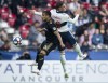 Vancouver Whitecaps defender Jake Nerwinski (28) heads the ball with Los Angeles FC defender Mohamed El-Munir (13) during the second half of MLS soccer action in Vancouver, B.C. Wednesday, April 17, 2019. The Vancouver Whitecaps finally have a win in the books but there was little time for celebration this week. THE CANADIAN PRESS/Jonathan Hayward