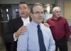 Glen Assoun, the Nova Scotia man who spent almost 17 years in prison for a crime he didn't commit, his lawyer Sean MacDonald and Ron Dalton, right, from the advocacy group Innocence Canada, stand outside Supreme Court in Halifax on Friday, July 12, 2019. An advocacy group pushing for justice system reforms to help the wrongly convicted will be making an announcement today in Toronto. Innocence Canada says two of the country's major federal parties have committed to creating a special tribunal to investigate wrongful convictions. THE CANADIAN PRESS/Andrew Vaughan