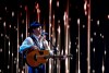 George Canyon performs during the Canadian Country Music Awards in Edmonton, Alberta on Sunday September 8, 2013. With his lantern jaw and big cowboy hat, country music star George Canyon is hard to miss as he campaigns for votes in rural Nova Scotia. THE CANADIAN PRESS/Jason Franson