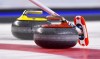 A Team Canada broom marks a stone during the Scotties Tournament of Hearts in St. Catharines, Ont., on Saturday, Feb. 18, 2017. Curling Canada high-performance director Gerry Peckham acknowledges that the current residency setup for elite Canadian curlers is an issue that is 