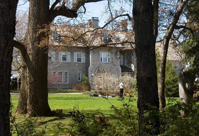 A gardener works on the grounds at the Prime Minister's residence at 24 Sussex Drive in Ottawa, Tuesday May 6, 2008. Nearly four years after Justin Trudeau opted not to move into the prime minister's official residence over concerns about its crumbling state, the building remains vacant short of staff who continue to use the kitchen to prepare meals for Trudeau and his family. THE CANADIAN PRESS/Tom Hanson