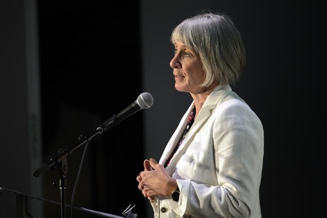 Patty Hajdu, Minister of Employment, Workforce Development and Labour, speaks during an event on workplace harassment and violence prevention fund in Toronto on Friday, July 5, 2019. Hajdu remembers encountering an angry — and racist — person at the doorstep. THE CANADIAN PRESS/Andrew Lahodynskyj
