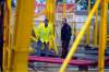 Boris Minkevich / Winnipeg Free Press
A Red River Ex worker and police officer look at the Crazy Mouse ride following an accident involving a boy Thursday.
