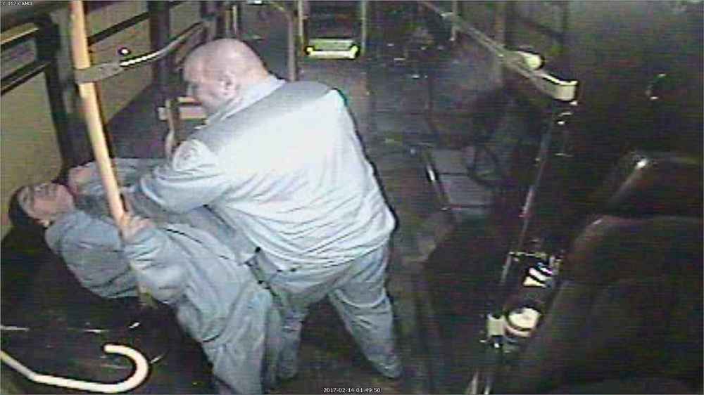 Bus driver Irvine Fraser (right) and passenger Brian Thomas are shown in Winnipeg in this 2017 still image from security video submitted into court as evidence.