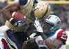 The Canadian Press
Winnipeg Blue Bombers' Cory Watson, left, is tackled by Montreal Alouettes' Mike Edem during first half CFL football action in Montreal Monday.