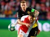 Borussia Dortmund's Marco Reus, rear, fights for the ball with Lukas Masopust from Slavia Prague, front, during the Champions League group F soccer match between Slavia Prague and Borussia Dortmund in Prague, Czech Republic, Wednesday, Oct. 2, 2019. (Ondrej Deml/CTK via AP)