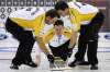 Jonathan Hayward / THE CANADIAN PRESS
Manitoba skip Rob Fowler, centre, watches his shot as lead Derek Samagalski, left and second Richard Daneault sweep during a morning draw against Saskatchewan at the Tim Hortons Brier in Saskatoon, Sask. Thursday.