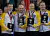 Andrew Vaughan / The Canadian Press
Manitoba's Jeff Stoughton, Jon Mead, Mark Nichols and Reid Carruthers, left to right, display their awards after winning the bronze medal at the Tim Hortons Brier in Kamloops, B.C. on Sunday.