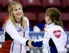 NATHAN DENETTE / THE CANADIAN PRESS
Jennifer Jones shakes hands with long-time rival and former teammate Kelly Scott of Brit­ish Columbia at the end of their match Tuesday. Jones won 10-7, fuelling the rivalry further.