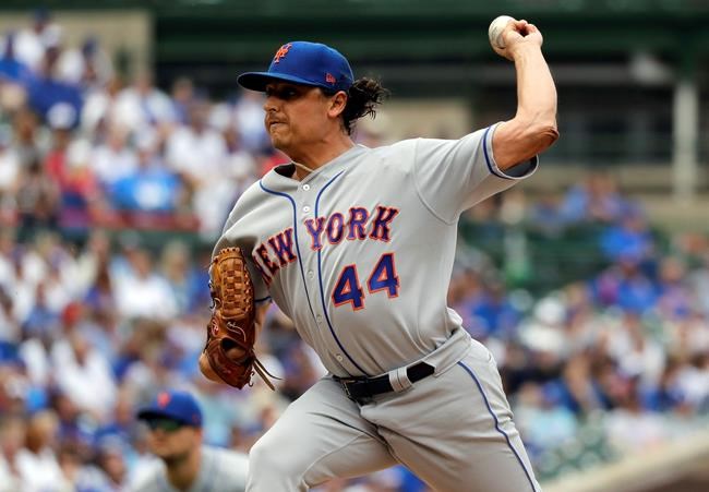New York Mets starting pitcher Jason Vargas throws against the Chicago Cubs during the first inning of a baseball game in Chicago, Friday, June 21, 2019. (AP Photo/Nam Y. Huh)