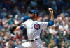 Chicago Cubs starting pitcher Cole Hamels (35) delivers against the St. Louis Cardinals during the first inning of a baseball game, Friday, June, 7, 2019, in Chicago. (AP Photo/David Banks)