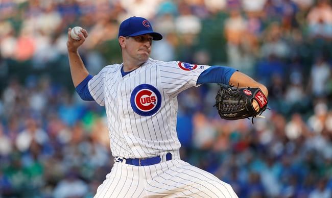 Chicago Cubs starting pitcher Kyle Hendricks delivers against the Oakland Athletics during the first inning of a baseball game, Monday, Aug. 5, 2019, in Chicago. (AP Photo/Kamil Krzaczynski)