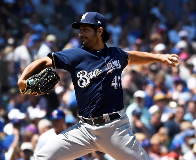 Milwaukee Brewers starting pitcher Gio Gonzalez (47) throws the ball against the Chicago Cubs during the first inning of a baseball game, Saturday, Aug. 3, 2019, in Chicago. (AP Photo/David Banks)
