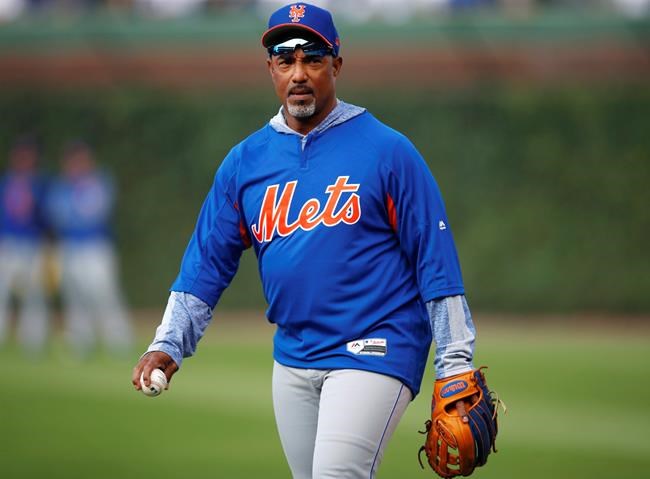 New York Mets bullpen coach Ricky Bones walks in from the outfield during batting practice for the team's baseball game against the Chicago Cubs on Thursday, June 20, 2019, in Chicago. (AP Photo/Jim Young)