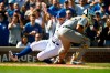 Chicago Cubs' Anthony Rizzo slides safely into home plate on a Nicholas Castellanos double as Pittsburgh Pirates catcher Elias Diaz waits for the throw during the second inning of a baseball game Saturday, Sept. 14, 2019, in Chicago. (AP Photo/Paul Beaty)