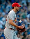 St. Louis Cardinals starting pitcher Adam Wainwright tosses the ball after Chicago Cubs' Willson Contreras hit a solo home run during the second inning of a baseball game Sunday, May 5, 2019, in Chicago. (AP Photo/Nam Y. Huh)