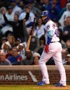 Chicago Cubs' Willson Contreras watches his grand slam during the first inning of the team's baseball game against the Chicago White Sox on Wednesday, June 19, 2019, at Wrigley Field in Chicago. (AP Photo/Paul Beaty)