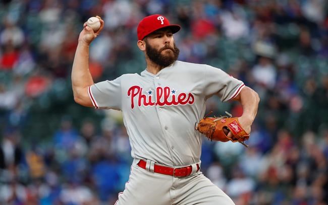 Philadelphia Phillies starting pitcher Jake Arrieta delivers against the Chicago Cubs during the first inning of a baseball game, Monday, May 20, 2019, in Chicago. (AP Photo/Kamil Krzaczynski)