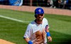 Chicago Cubs' Daniel Descalso (3) scores during the first inning of a baseball game against the St. Louis Cardinals, Saturday, May 4, 2019, in Chicago. (AP Photo/Matt Marton)