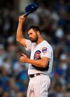 Chicago Cubs starting pitcher Cole Hamels tips his hat to the crowd after earning his 2,500 career strikeout during the third inning of a baseball game against the Chicago White Sox Tuesday, June 18, 2019, at Wrigley Field in Chicago. (AP Photo/Paul Beaty)