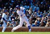 Chicago Cubs' Kris Bryant hits a two-run double against the Arizona Diamondbacks during the second inning of a baseball game, Friday, April 19, 2019, in Chicago. (AP Photo/David Banks)