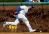 Chicago Cubs second baseman Daniel Descalso can't make the play on a single by Arizona Diamondbacks' Christian Walker during the first inning of a baseball game Saturday, April 20, 2019, in Chicago. (AP Photo/Nam Y. Huh)