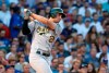 Oakland Athletics' Matt Olson watches his two-run single off Chicago Cubs starting pitcher Jon Lester during the second inning of a baseball game Tuesday, Aug. 6, 2019, in Chicago. (AP Photo/Charles Rex Arbogast)