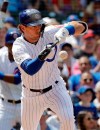 Chicago Cubs' Albert Almora Jr., drops a sacrifice bunt during the fourth inning of a baseball game against the Cincinnati Reds, Saturday, May 25, 2019, in Chicago. (AP Photo/Nam Y. Huh)