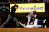 Second base umpire Jeff Nelson calls Chicago Cubs' Nicholas Castellanos safe at second as Cincinnati Reds' Alex Blandino applies a tag during the fourth inning of a baseball game Wednesday, Sept. 18, 2019, in Chicago. (AP Photo/Charles Rex Arbogast)