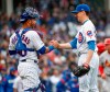 Chicago Cubs starting pitcher Kyle Hendricks, right, celebrates with catcher Willson Contreras, left, after the final out against the St. Louis Cardinals in the ninth inning of a baseball game, Friday, May 3, 2019, in Chicago. (AP Photo/Kamil Krzaczynski)