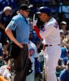 Chicago Cubs' Carlos Gonzalez, right, argues with home plate umpire Nic Lentz after being called out on strikes during the fourth inning of a baseball game against the Atlanta Braves in Chicago, Thursday, June 27, 2019. (AP Photo/Nam Y. Huh)