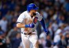 Chicago Cubs' David Bote watches his three-run double against the Colorado Rockies during the sixth inning of a baseball game Wednesday, June 5, 2019, in Chicago. (AP Photo/Kamil Krzaczynski)