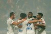 Lyon's Moussa Dembele his teammates, celebrates his goal against Nice during the French League One soccer match between Lyon and Nice, at Groupama stadium in Decines, near Lyon, central France, Saturday, Nov. 23, 2019. (AP Photo/Laurent Cipriani)