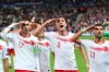 Turkey players salute as they celebrated a goal against France during the Euro 2020 group H qualifying soccer match between France and Turkey at Stade de France at Saint Denis, north of Paris, France, Monday, Oct. 14, 2019. (AP Photo/Thibault Camus)