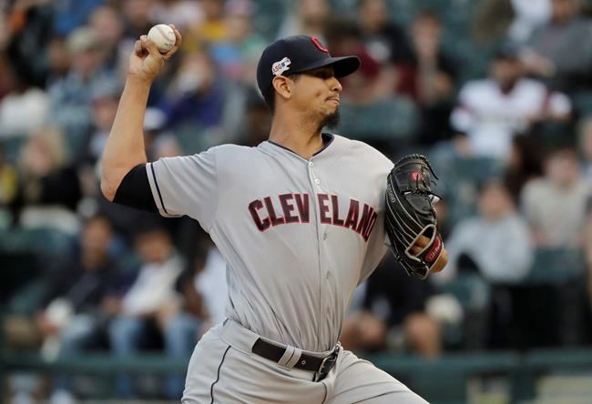Cleveland Indians starting pitcher Carlos Carrasco throws to a Chicago White Sox batter during the first inning of a baseball game in Chicago, Thursday, May 30, 2019. (AP Photo/Nam Y. Huh)