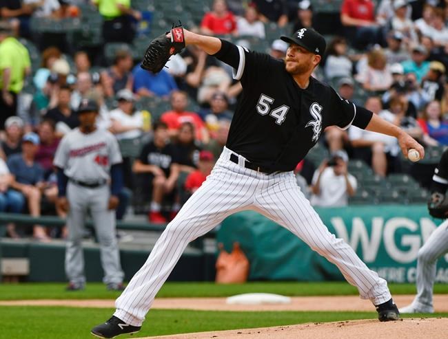 Chicago White Sox starting pitcher Ross Detwiler delivers during the first inning of the team's baseball game against the Minnesota Twins on Friday, June 28, 2019, in Chicago. (AP Photo/Matt Marton)