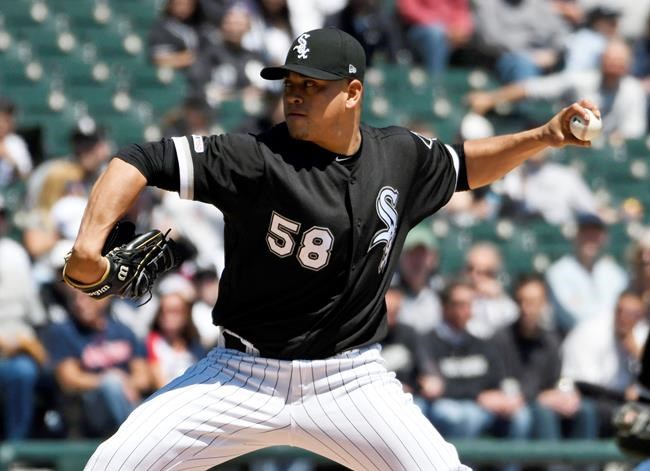 Chicago White Sox starter Manny Banuelos pitches against the Cleveland Indians during the first inning of a baseball game, Tuesday, May 14, 2019, in Chicago. (AP Photo/David Banks)