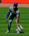 New York Mets pitcher Marcus Stroman warms up before a baseball game against the Chicago White Sox Wednesday, July 31, 2019, in Chicago. (AP Photo/Matt Marton)