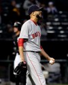 Boston Red Sox starting pitcher David Price reacts after Chicago White Sox's James McCann hit a two-run home run during the first inning of a baseball game in Chicago, Thursday, May 2, 2019. (AP Photo/Nam Y. Huh)
