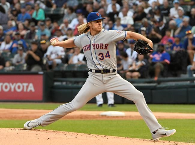 New York Mets starting pitcher Noah Syndergaard throws to a Chicago White Sox batter during the first inning of a baseball game Tuesday, July 30, 2019, in Chicago. (AP Photo/David Banks)