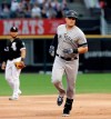 New York Yankees' Luke Voit rounds the bases after hitting a solo home run during the first inning of a baseball game against the Chicago White Sox in Chicago, Friday, June 14, 2019. (AP Photo/Nam Y. Huh)