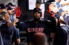 Cleveland Indians' Franmil Reyes is congratulated in the dugout after scoring on a single by Mike Freeman during the third inning of the team's baseball game against the Chicago White Sox on Wednesday, Sept. 25, 2019, in Chicago. (AP Photo/Charles Rex Arbogast)