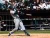 Seattle Mariners' Ryon Healy (27) hits an RBI double against the Chicago White Sox during the fourth inning of a baseball game in Chicago, Saturday, April 6, 2019. (AP Photo/Matt Marton)