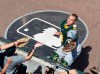 Oakland Athletics catcher Dustin Garneau, right, cannot make a catch on a hit by Chicago White Sox's Ryan Cordell during the third inning of a baseball game, Friday, Aug. 9, 2019, in Chicago. (AP Photo/David Banks)